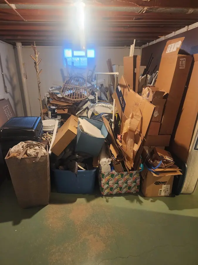 Roll-off dumpster container at job site for Concrete Dumpster Rental in Kodiak